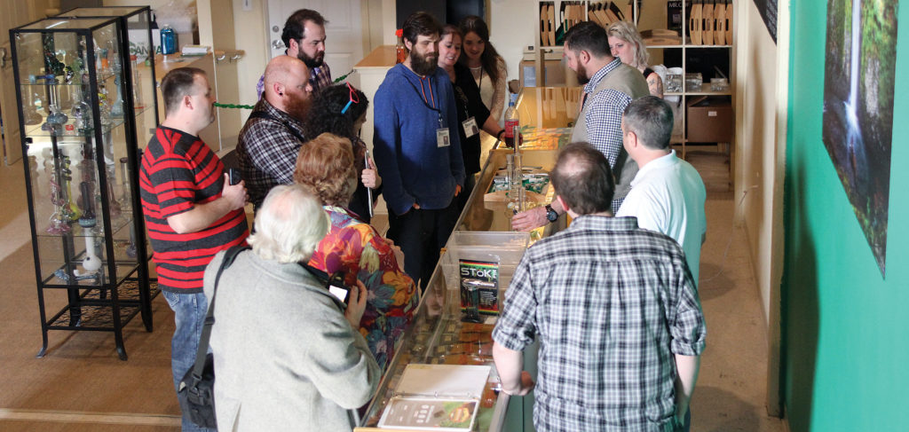 Employees of North Bonneville's Cannabis Corner gather for a pre-opening team meeting.