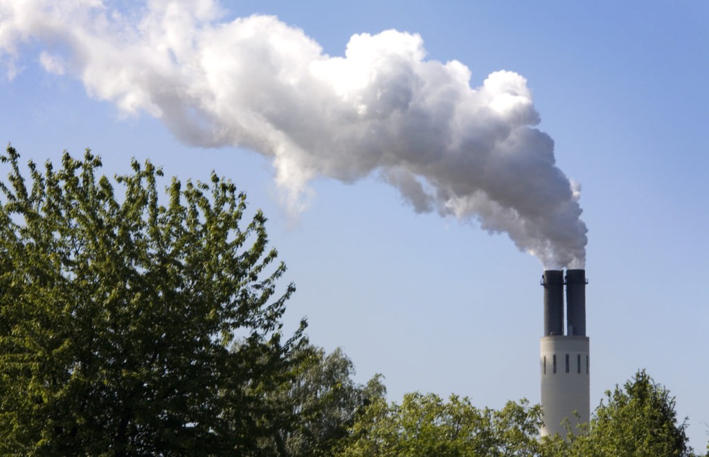 An electricity power plant smokestack in Berlin, Germany