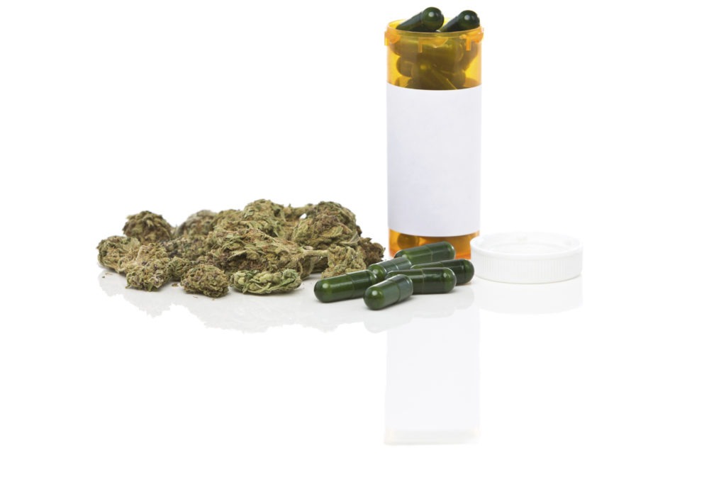 Marijuana, pills and pill bottle
